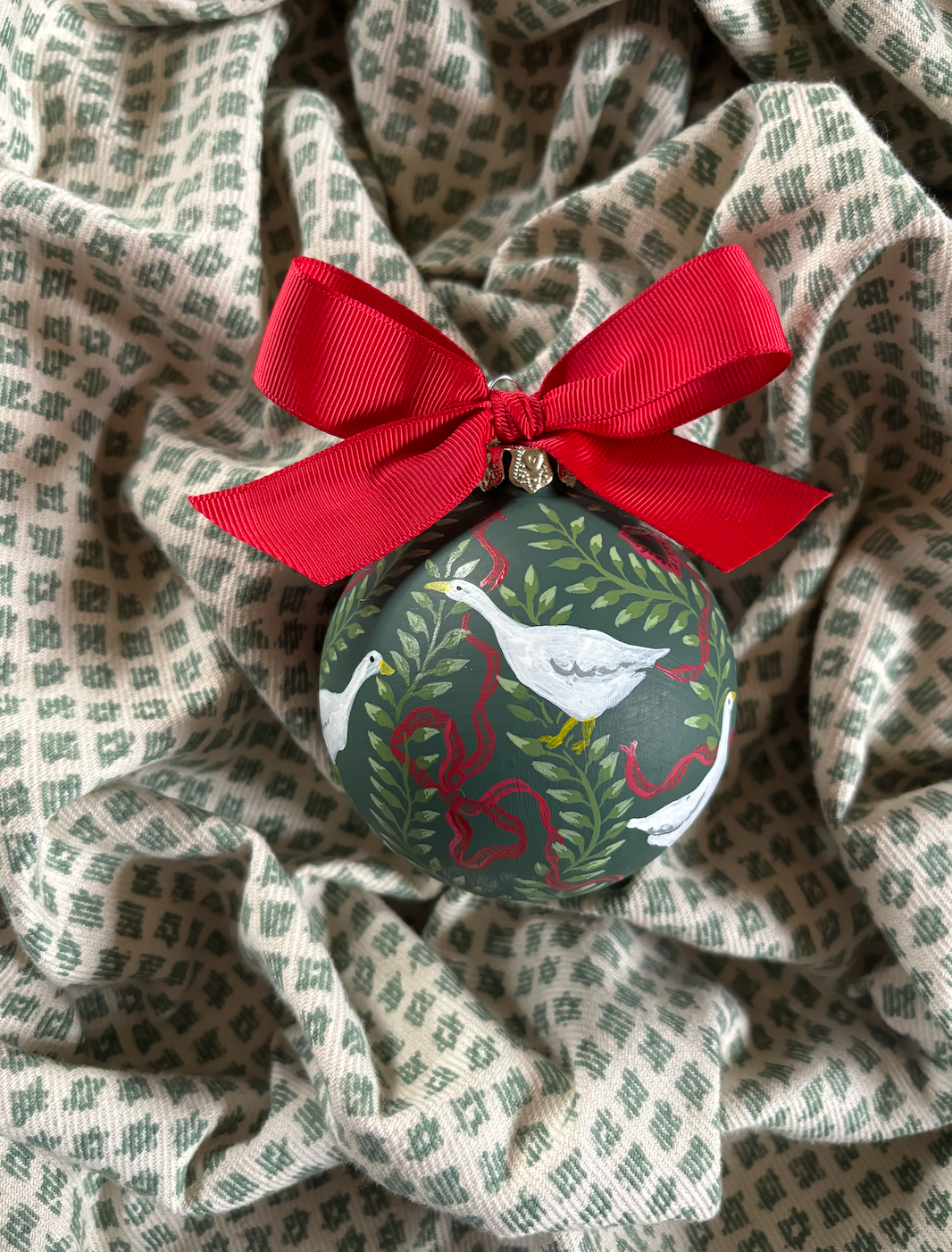 Heirloom ornament - Geese and red ribbon